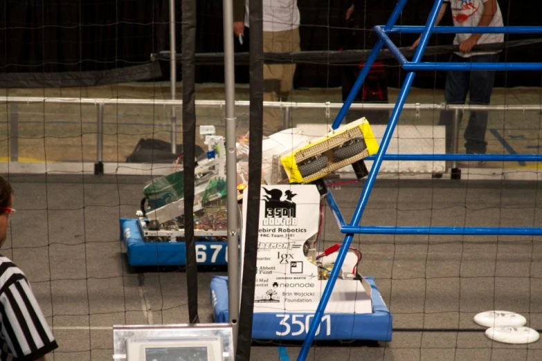 an obstacle race with a racing car driving along the course