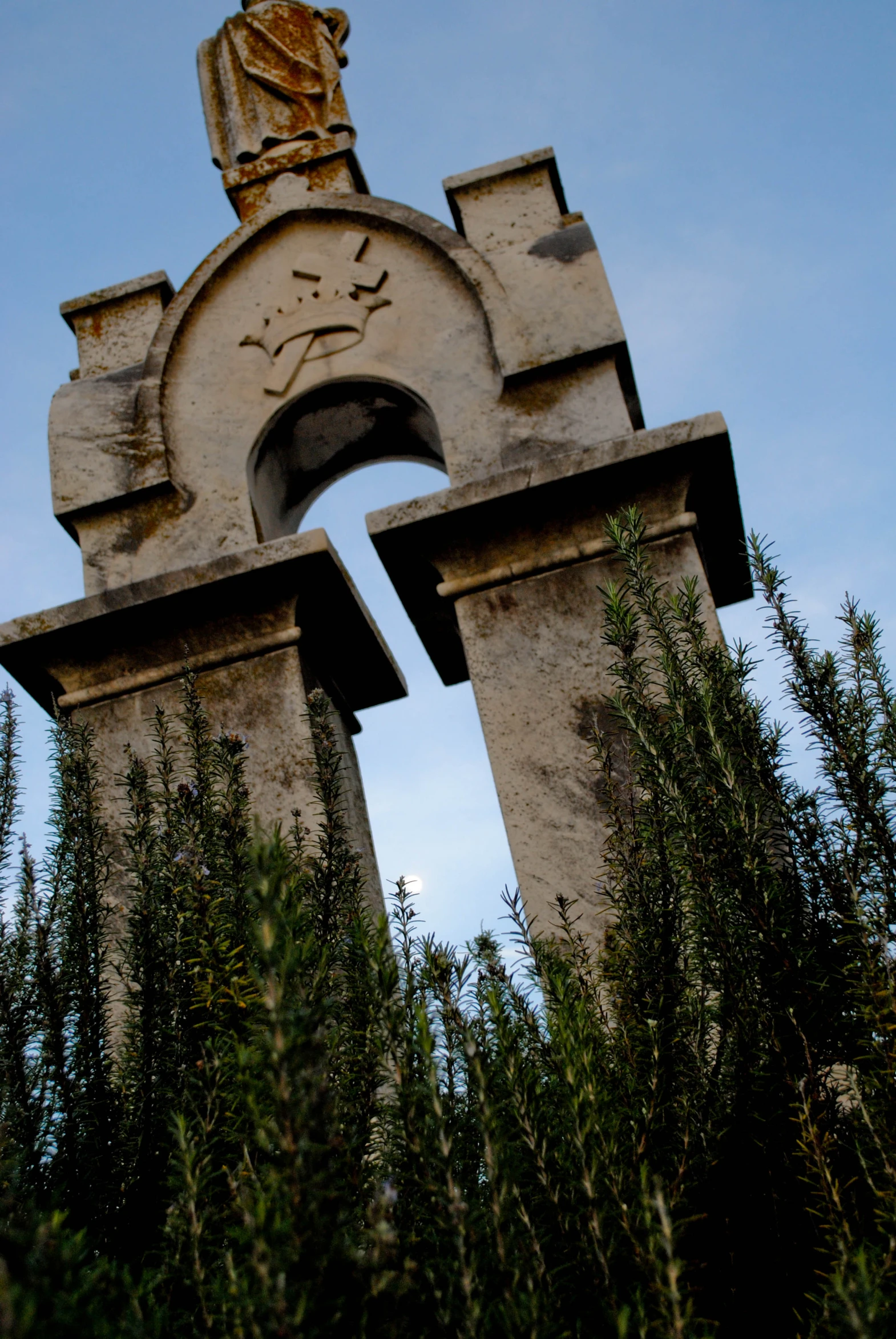 a tall white tower with a clock on the top