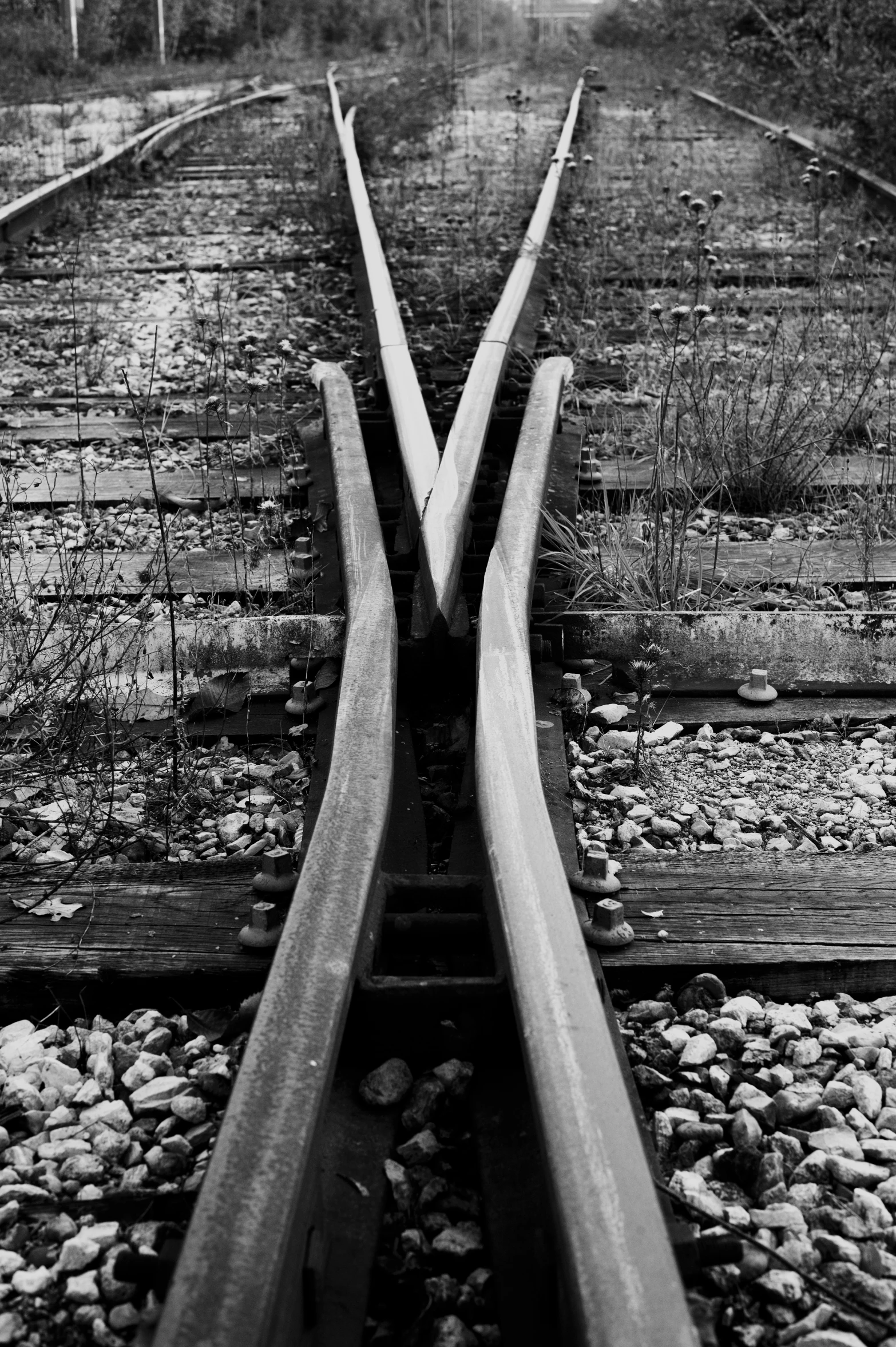 a train track with three lines going across it