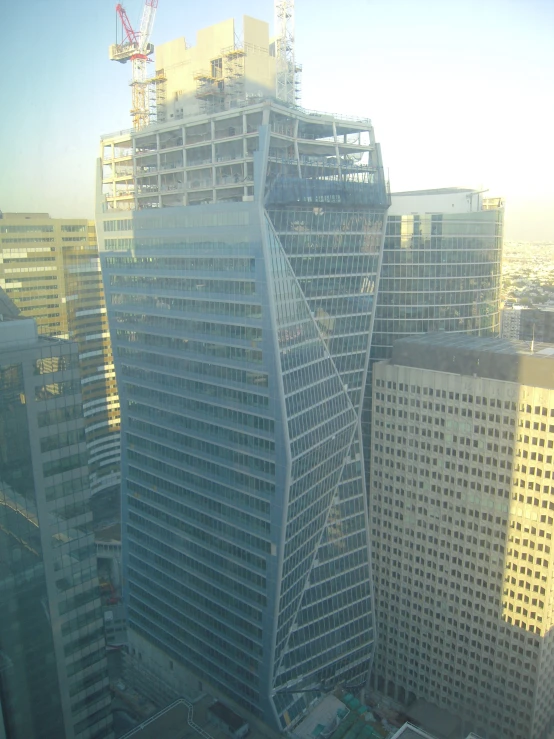 a view of two buildings from a high up looking