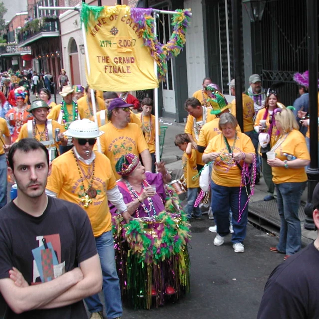 a parade with a lot of people on the street