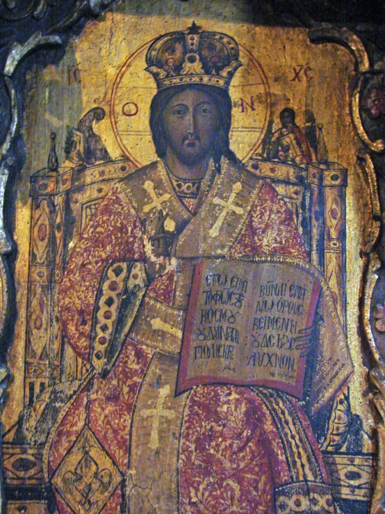 the icon depicts the person holding the cross