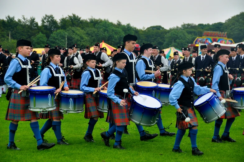 people playing drums with their drums