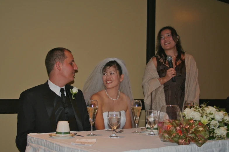 bride and groom at wedding reception in conference room