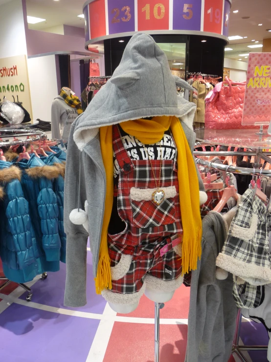 a store display featuring clothes for children and toddlers