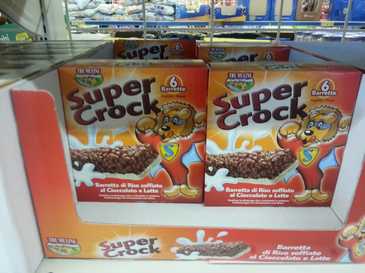 a display case of cereal sits on the shelves