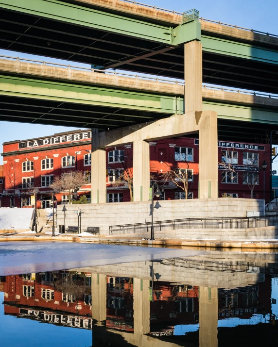 an image of the reflection of a city on a body of water