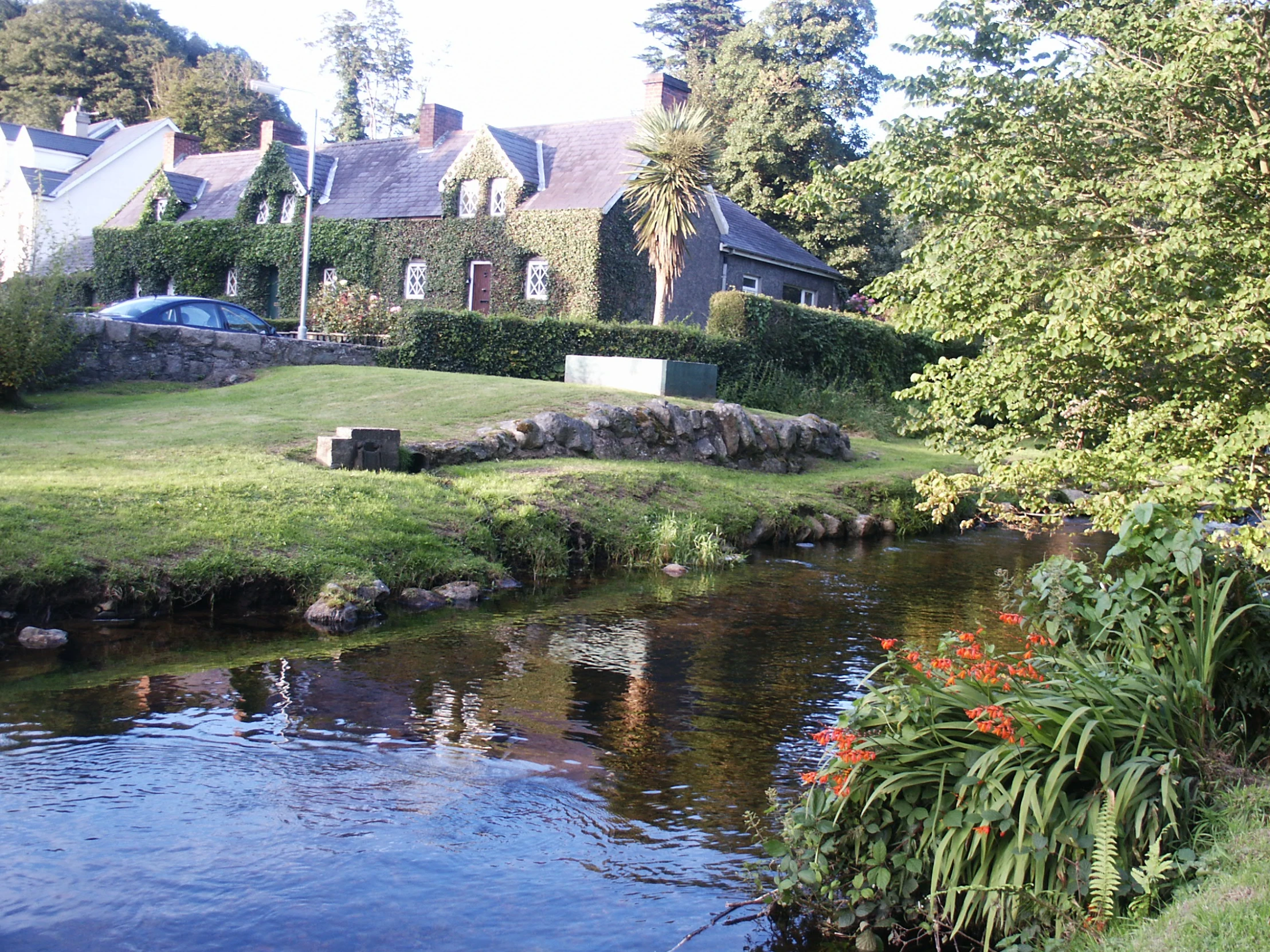 there is a house along side a river