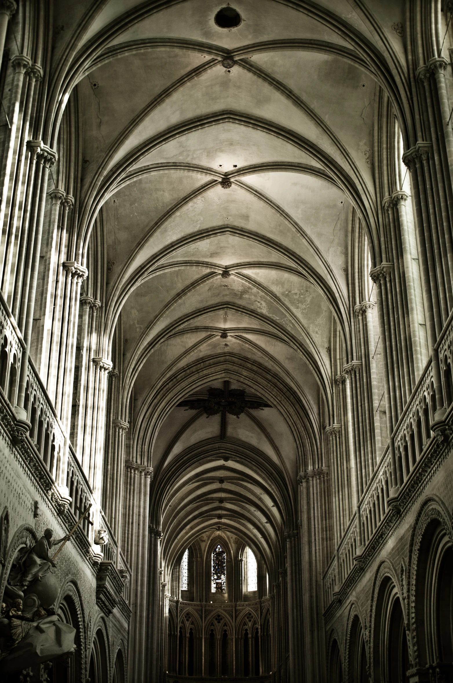 large open cathedral with high vaulted ceilings, ornately carved