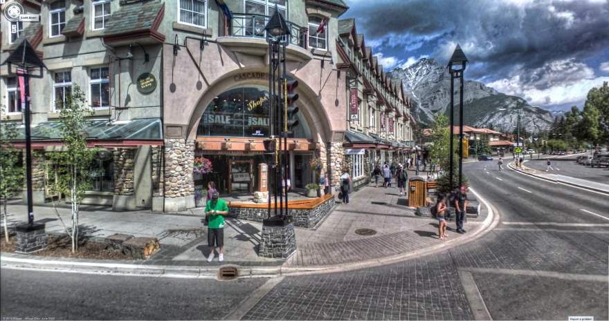 the street is very wide and quiet on a cloudy day