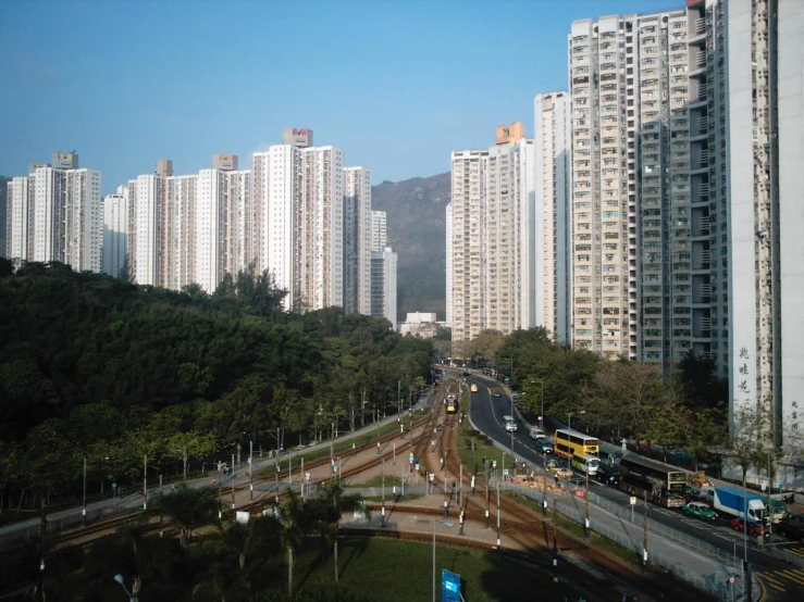 a large city area with tall buildings and construction