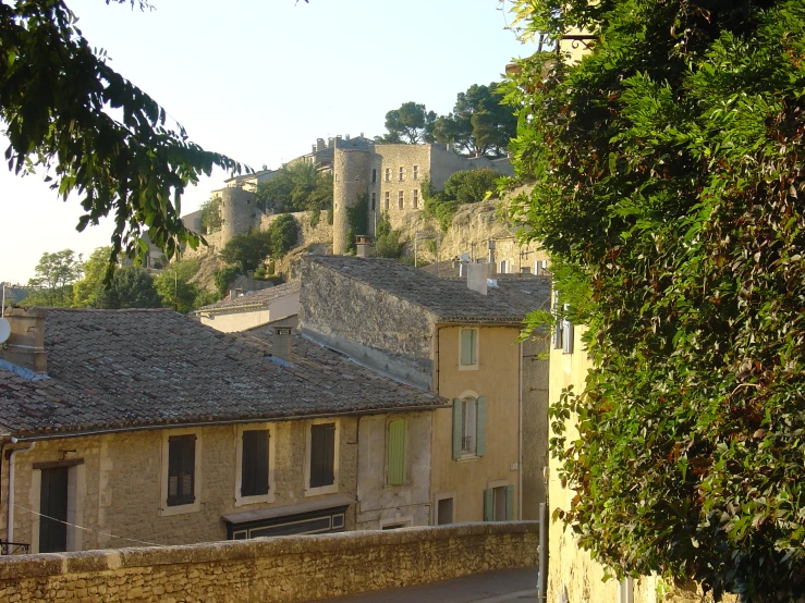 a small city with old buildings and some big towers