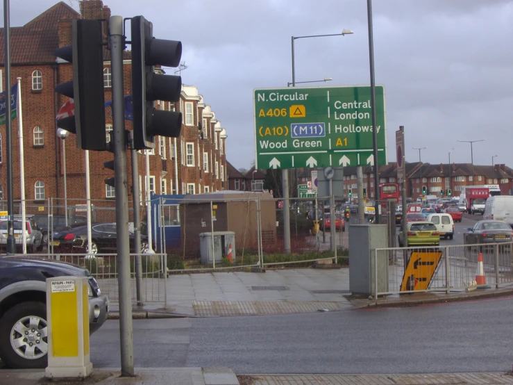 the traffic light is red in the middle of the street