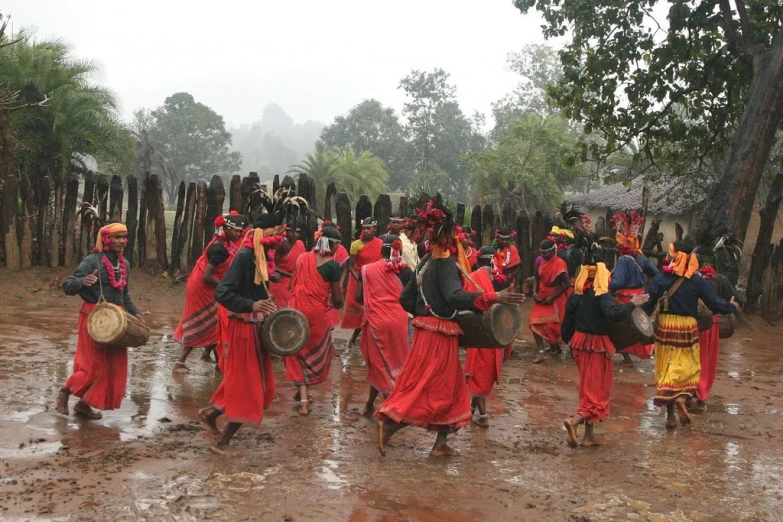 an image of a group of people dressed in traditional attire