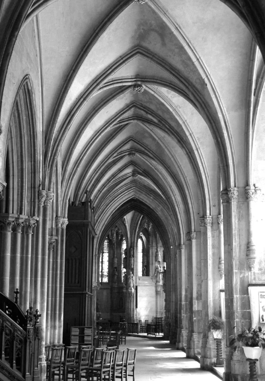 there are rows of chairs in the cathedral