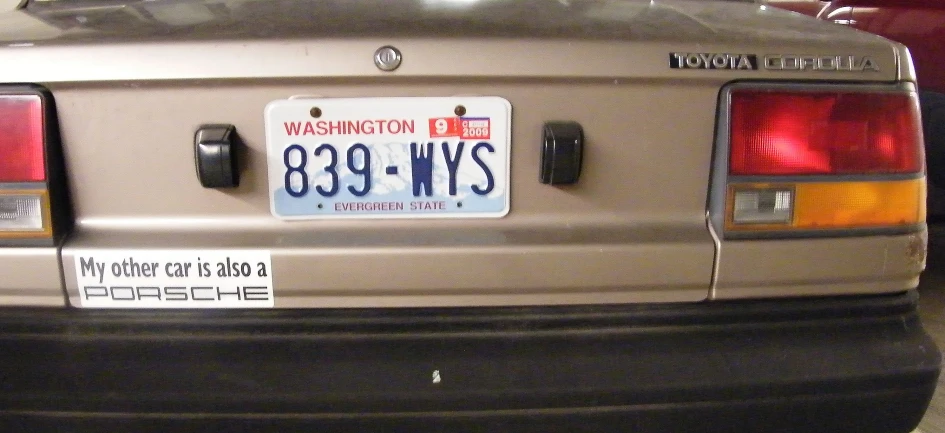 a rear view of a car with license plates on