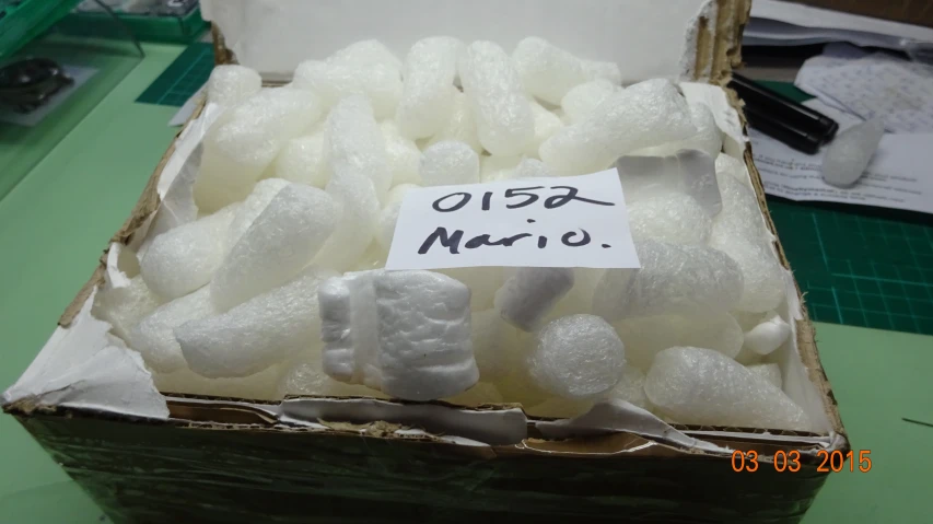 a small box filled with white sugar cubes