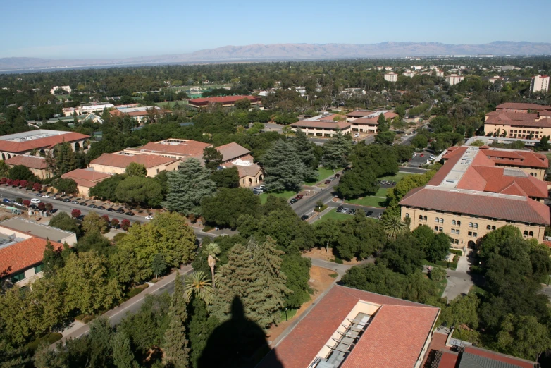 an aerial view of a city with lots of trees