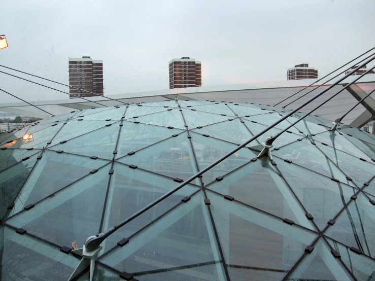 a close up of a structure on a cloudy day