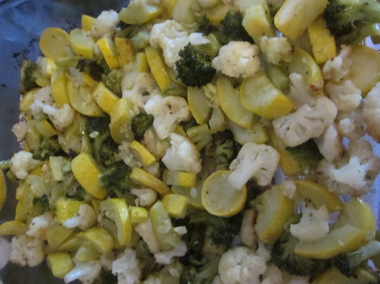 a plate filled with rice, broccoli and cauliflower
