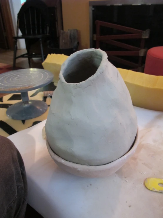 white sneakers on top of a table in a living room