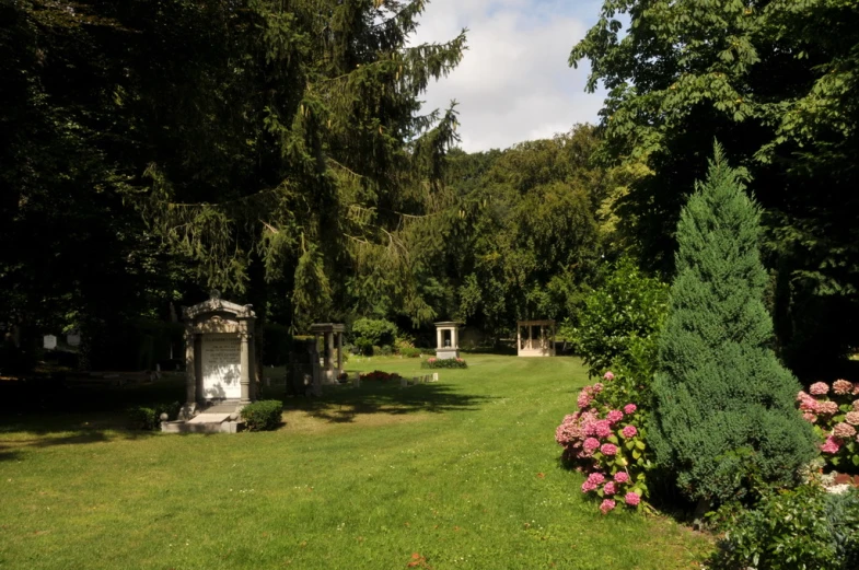 the gardens are full of trees and flowers