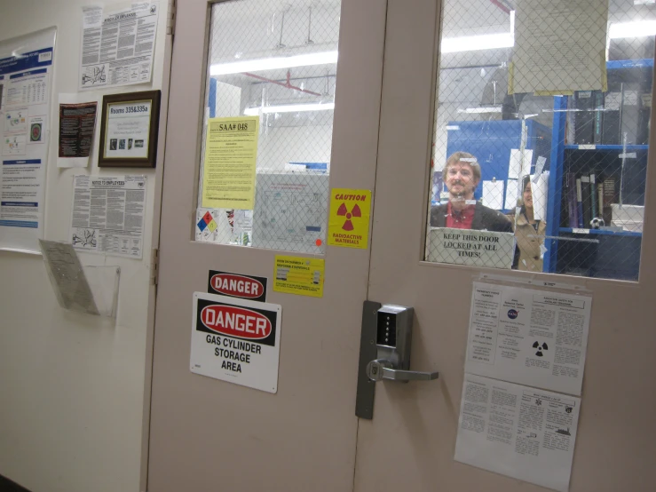 this is an indoor door with bulletins