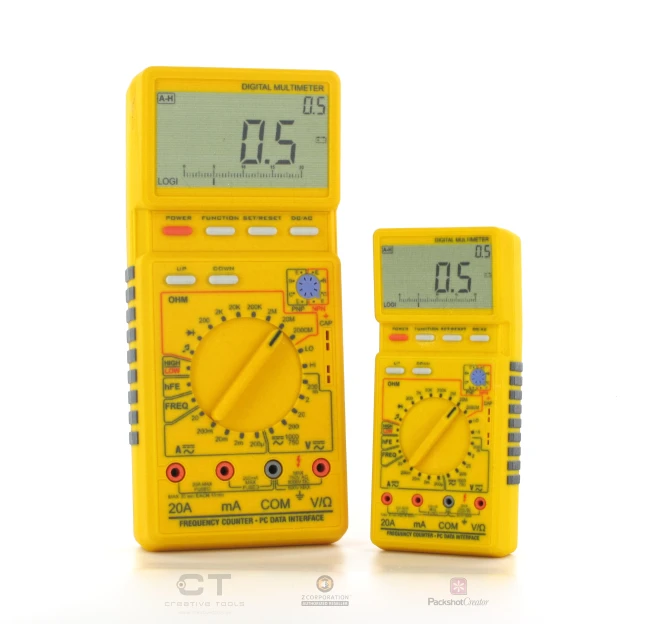 two yellow electronic meters on white background