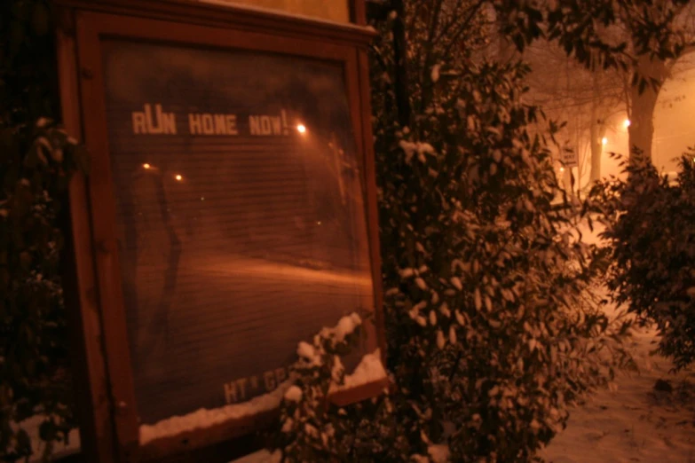 a building with a sign reading the entrance to it