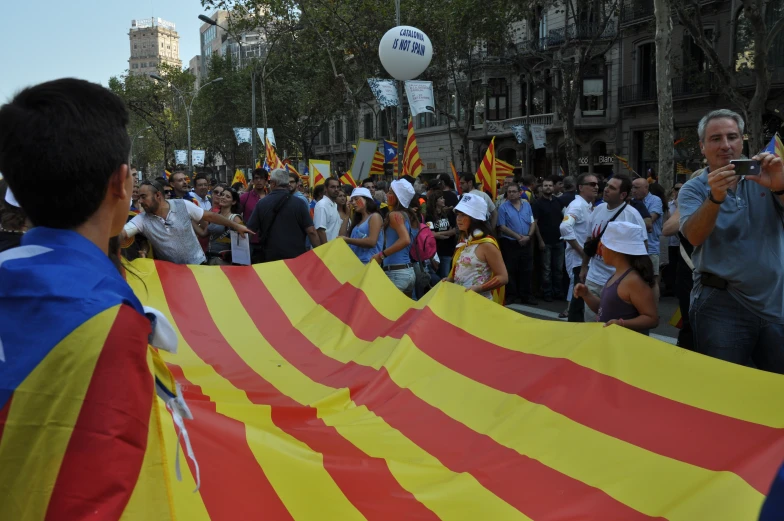 there are many people marching in the street together