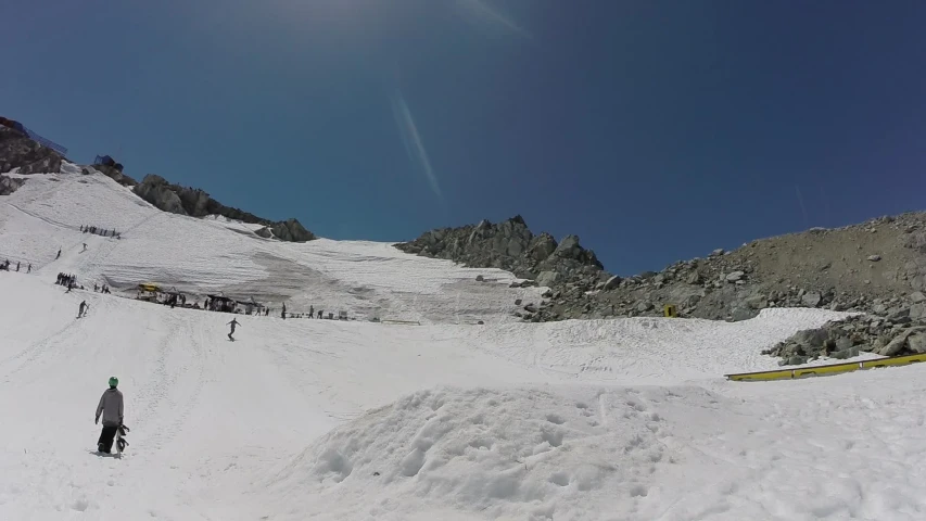 this is a picture of people standing in the snow