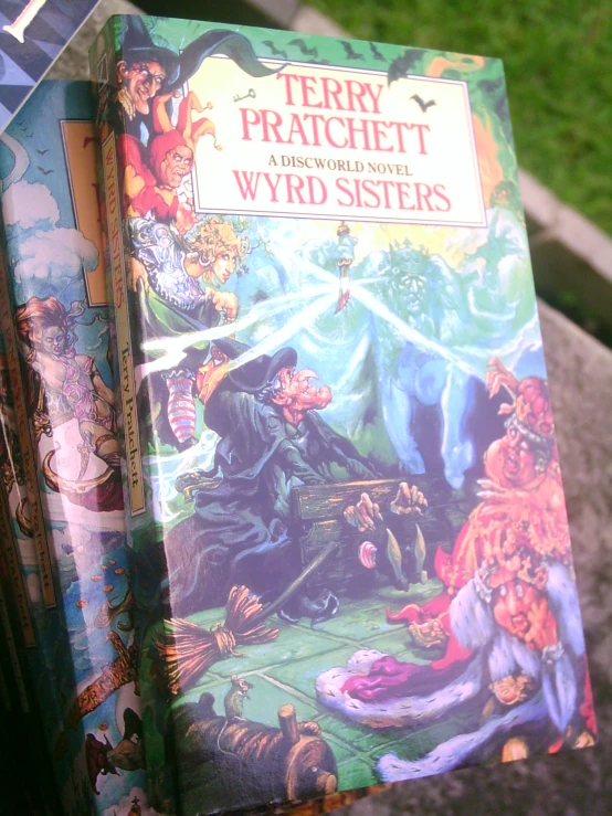 a stack of two books with characters on it