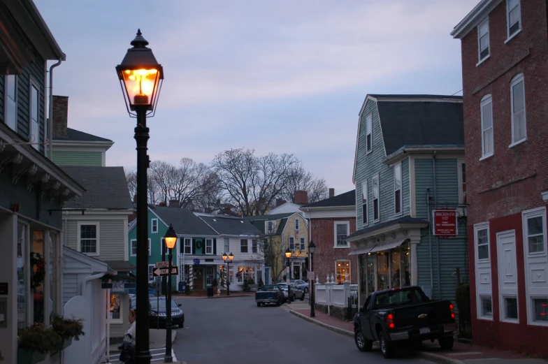 an empty street in a small town at twilight