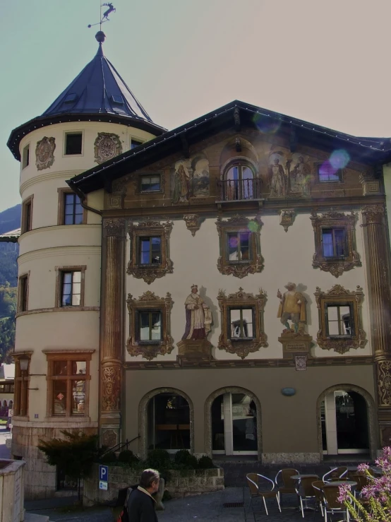 an ornate building in the middle of a town