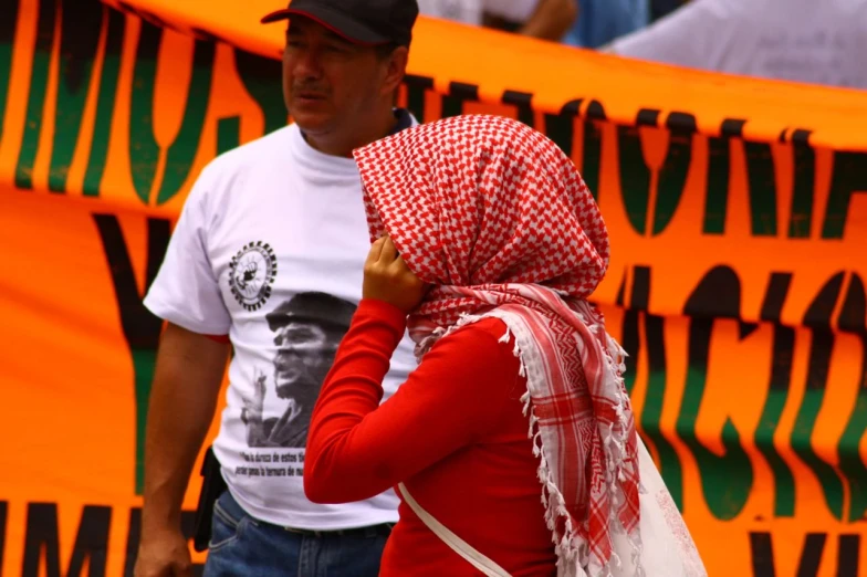 a man and a woman standing next to each other