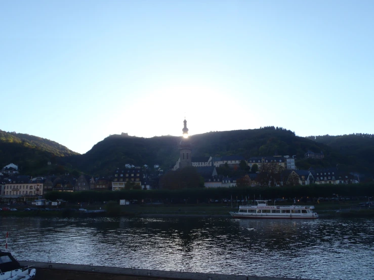 a city skyline on the edge of a body of water