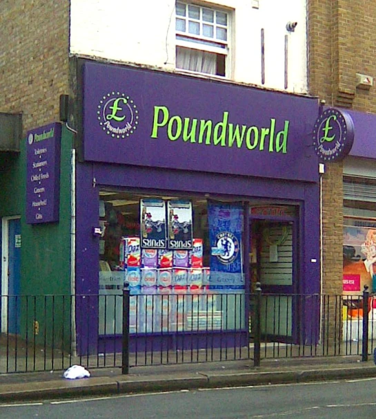 this poundworld store has a purple sign on the door