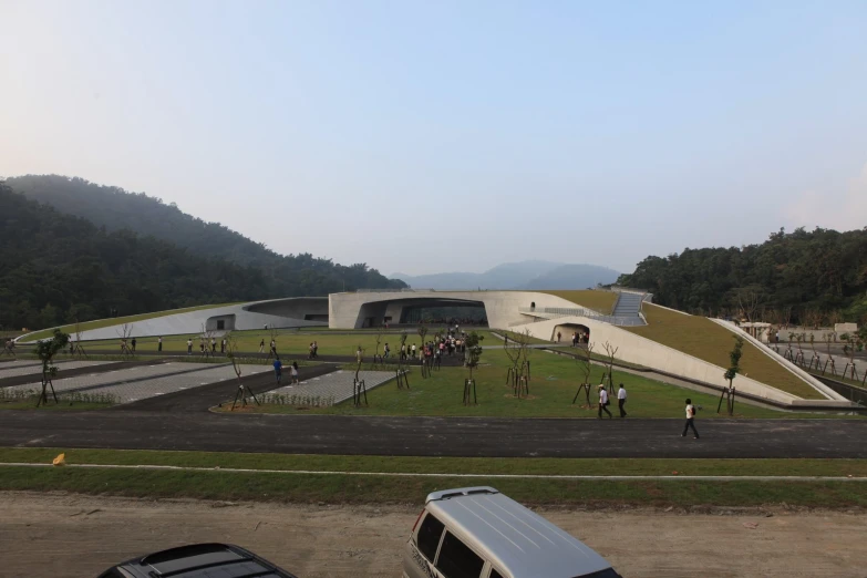 a picture of a building in a mountain side