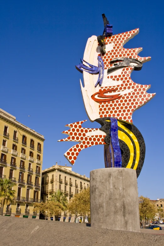 a large sculpture is in a city park