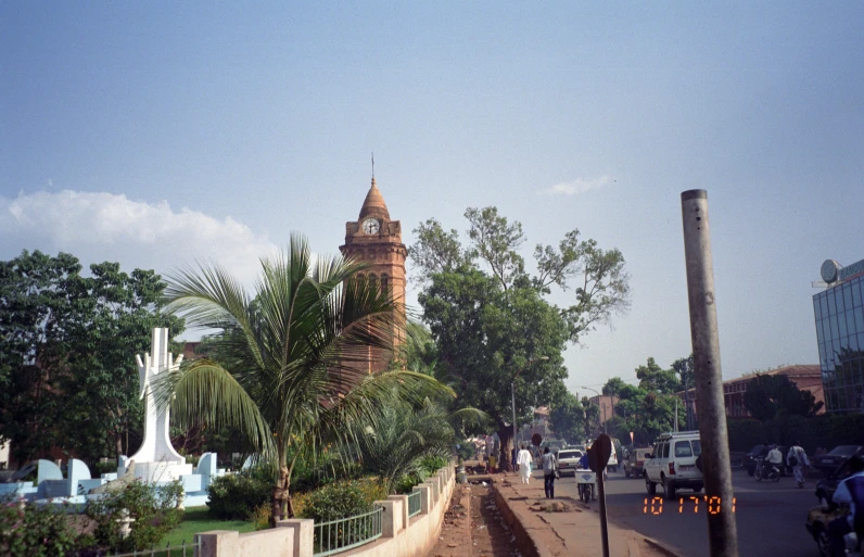 a po of some trees and buildings on a street