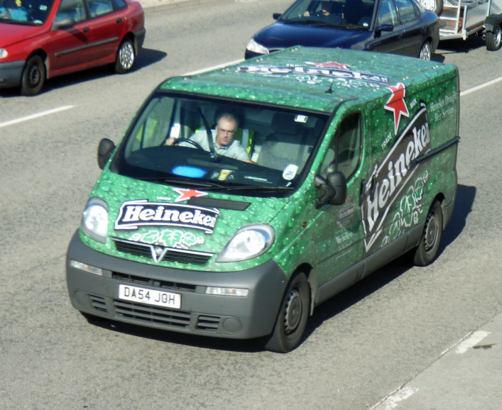 a small van has been covered in green glitter paint