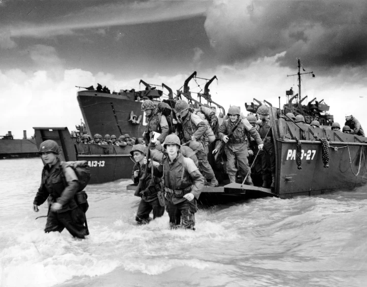 soldiers getting onto a boat while others watch