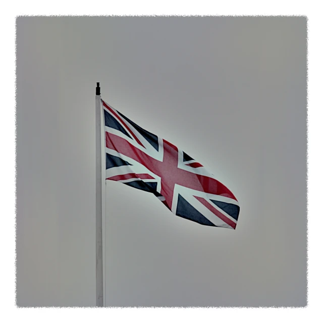 an image of a union jack flag flying on top of the pole