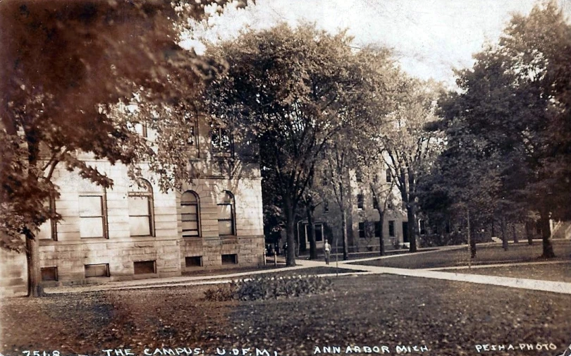 this is a picture of an old po of a house and trees