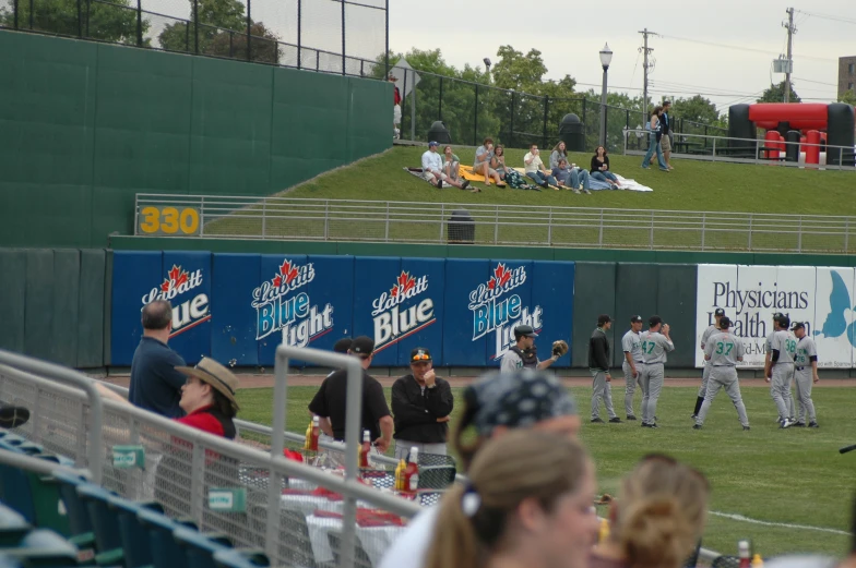 a baseball game in progress with a crowd