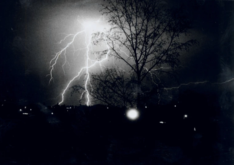 a lightning bolt hitting the sky in the dark
