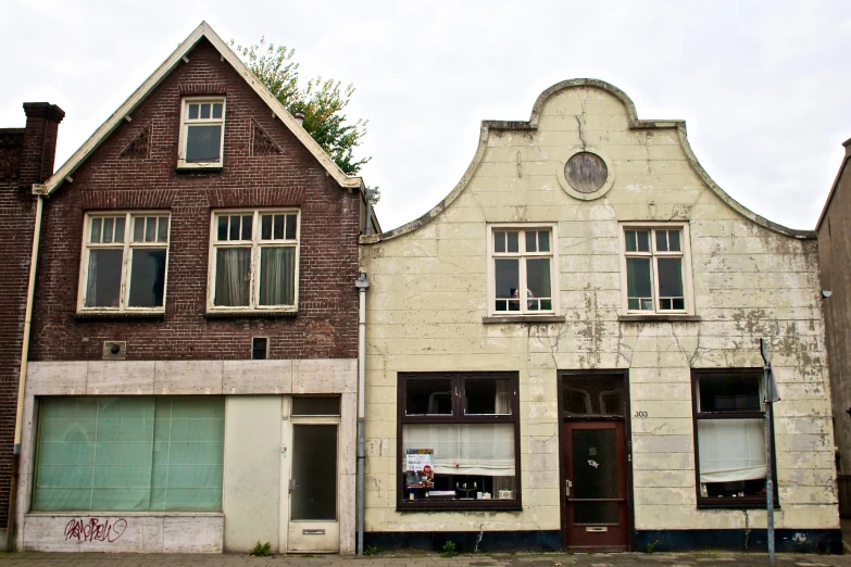 two buildings that are on a street side