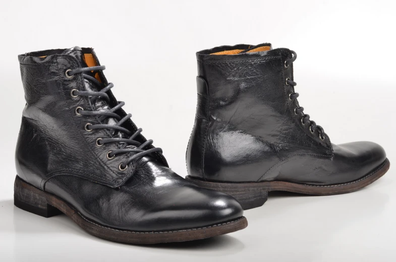 an image of a man's black boots