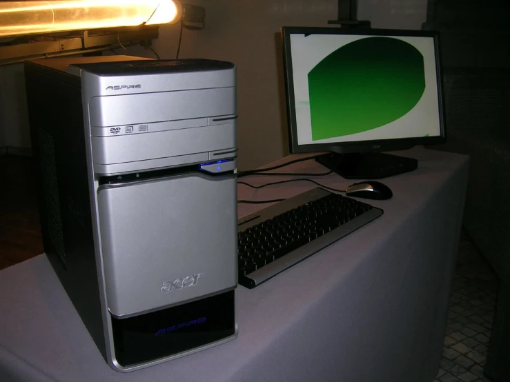 computer tower with desktop and dual monitor setup