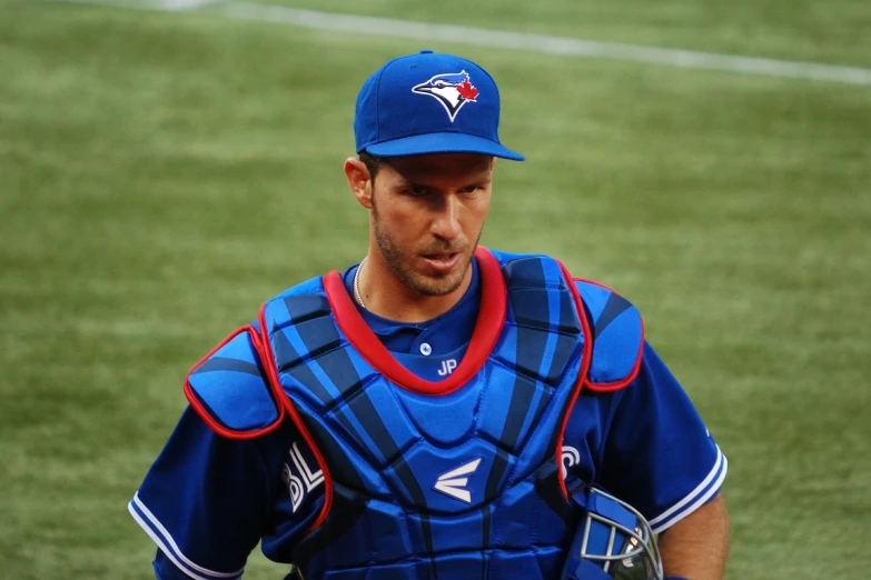 a toronto blue jackets player standing on a field